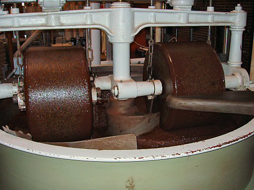 two granite wheels in a cacao melanger