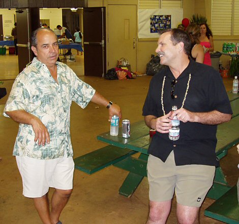 two men laughing for the camera