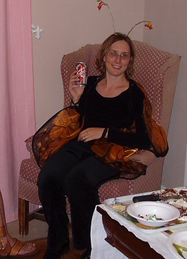 young woman in a chair and a butterfly outfit