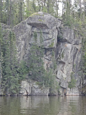 Face of an indian in the rock of the lake wall