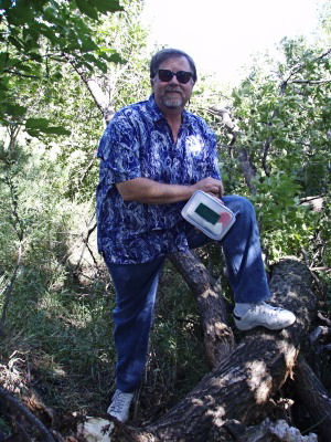 Picking up a geocache in Winnipeg